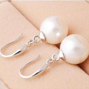 Naked IOBI Pearl Drill Earrings in Three Sizes for Woman