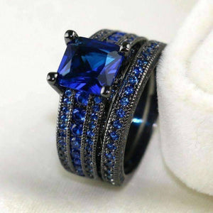 Feshionn IOBI Rings Moonlight Serenade Blue CZ and Black Gold Solitaire Engagement Ring Set